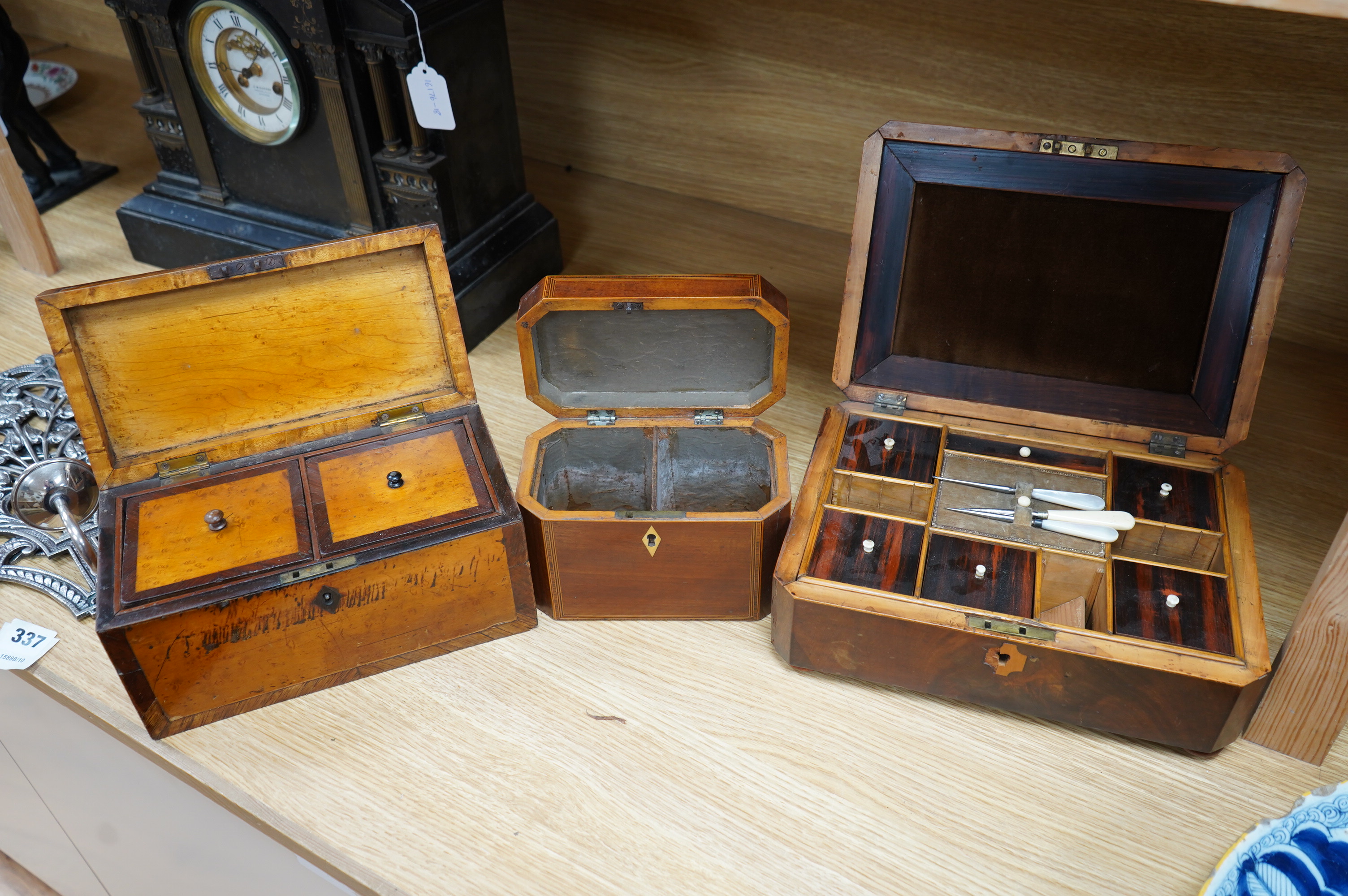 A 19th century mahogany work box and two tea caddies, largest work box 29cm wide, 20cm deep (3). Condition - poor to fair